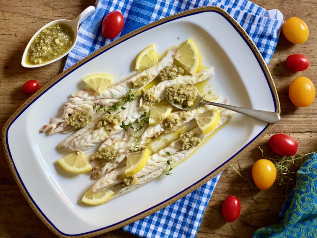 Branzino con Pesto di Capperi e Mandorle